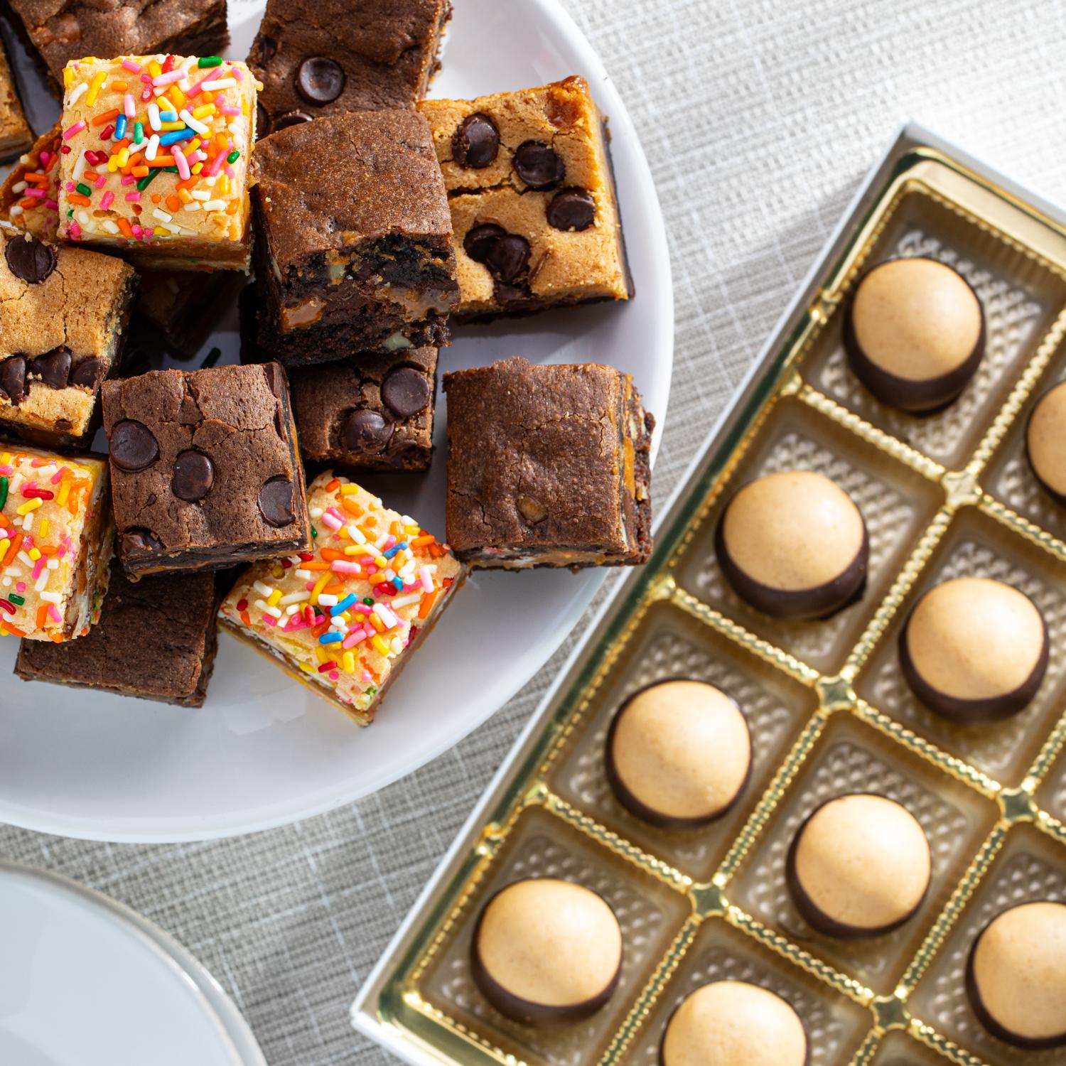 Assorted 16 count killer brownie and 12 count DLM buckeyes 