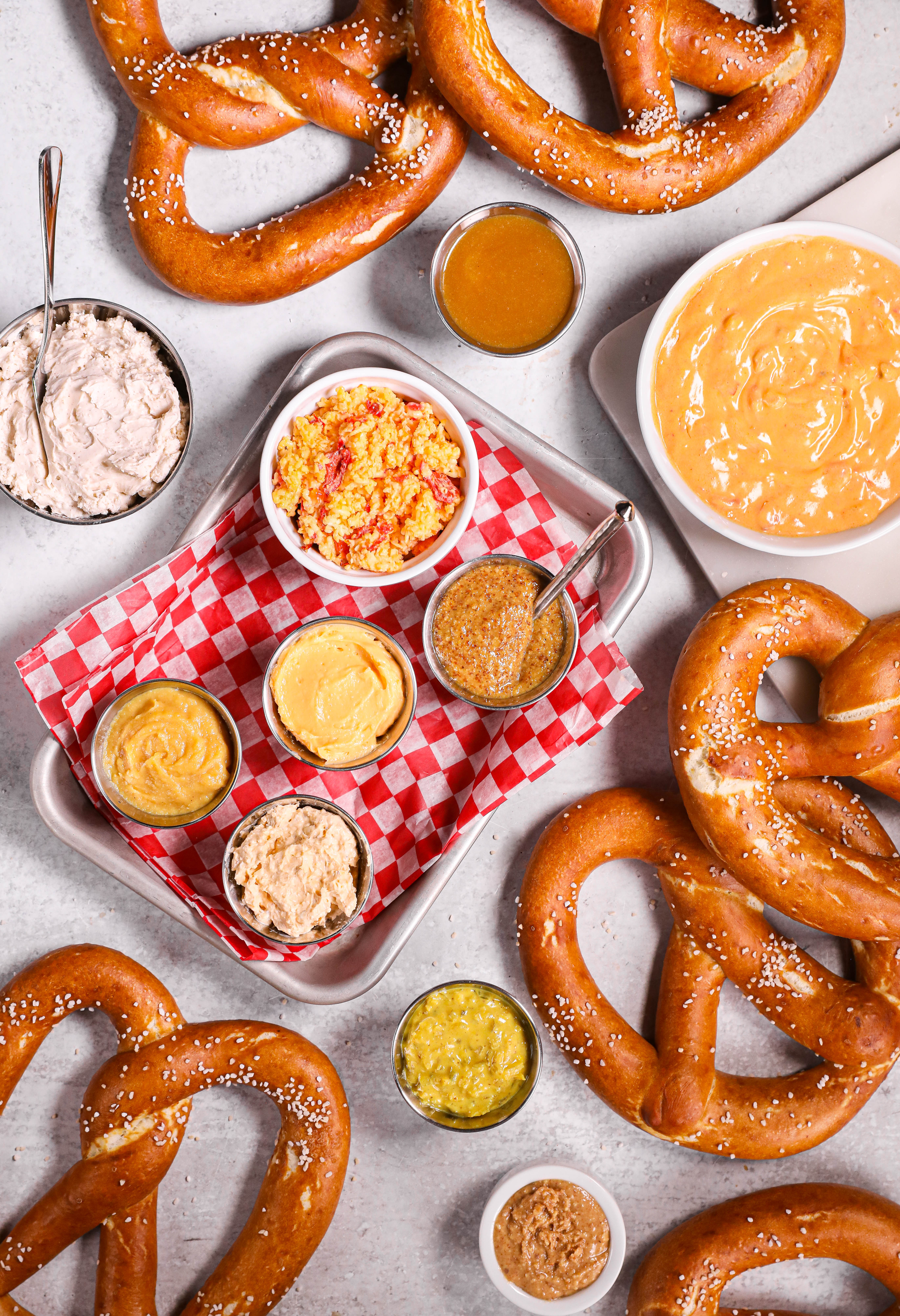 bavarian-style pretzels with various dips