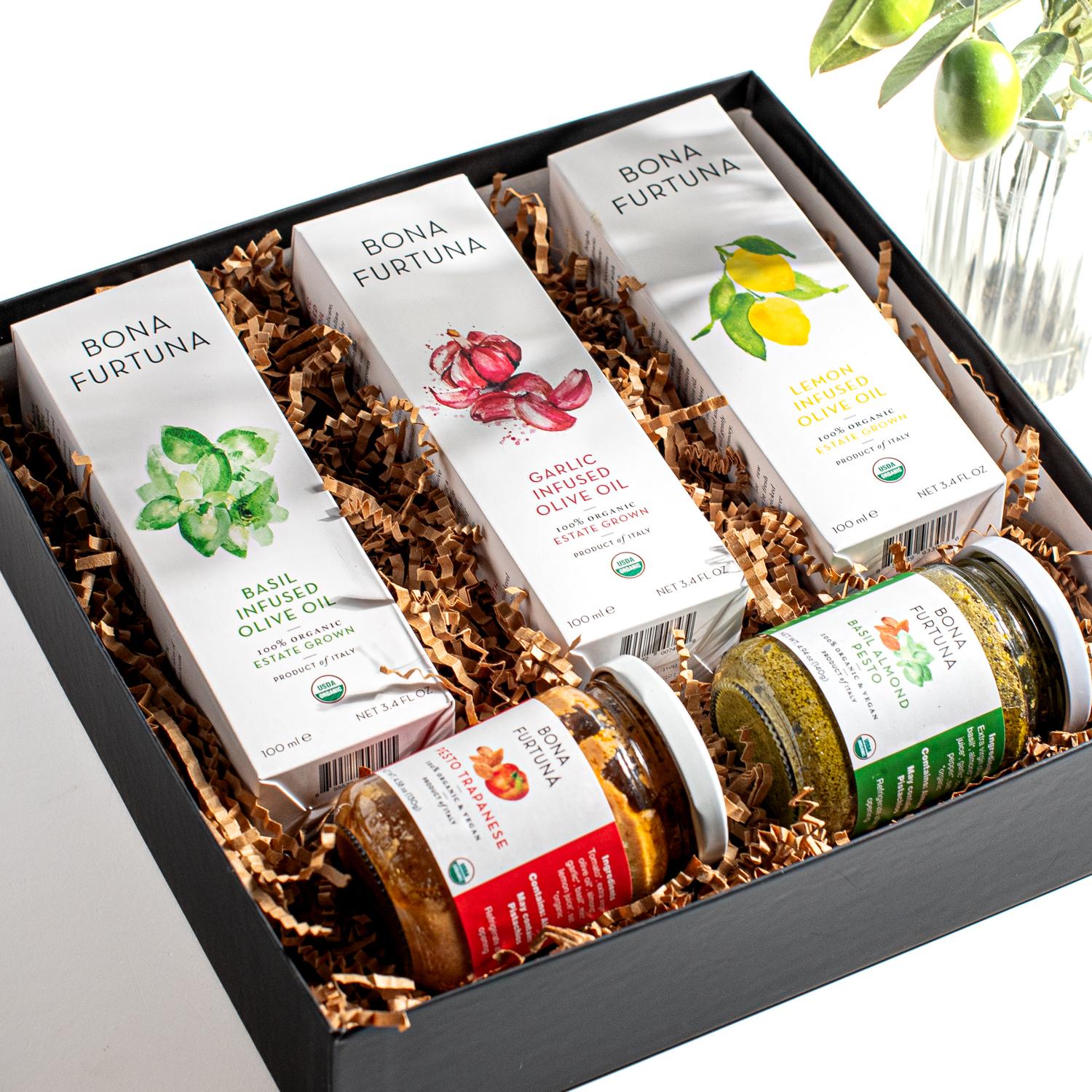 bona furtuna sicilian sampler with basil almonds pesto, tomato almond pesto, garlic infused olive, organic lemon infused olive oil and basil infused organic olive oil