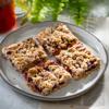 Healthy breakfast bars with raspberry marmalade and rolled oats