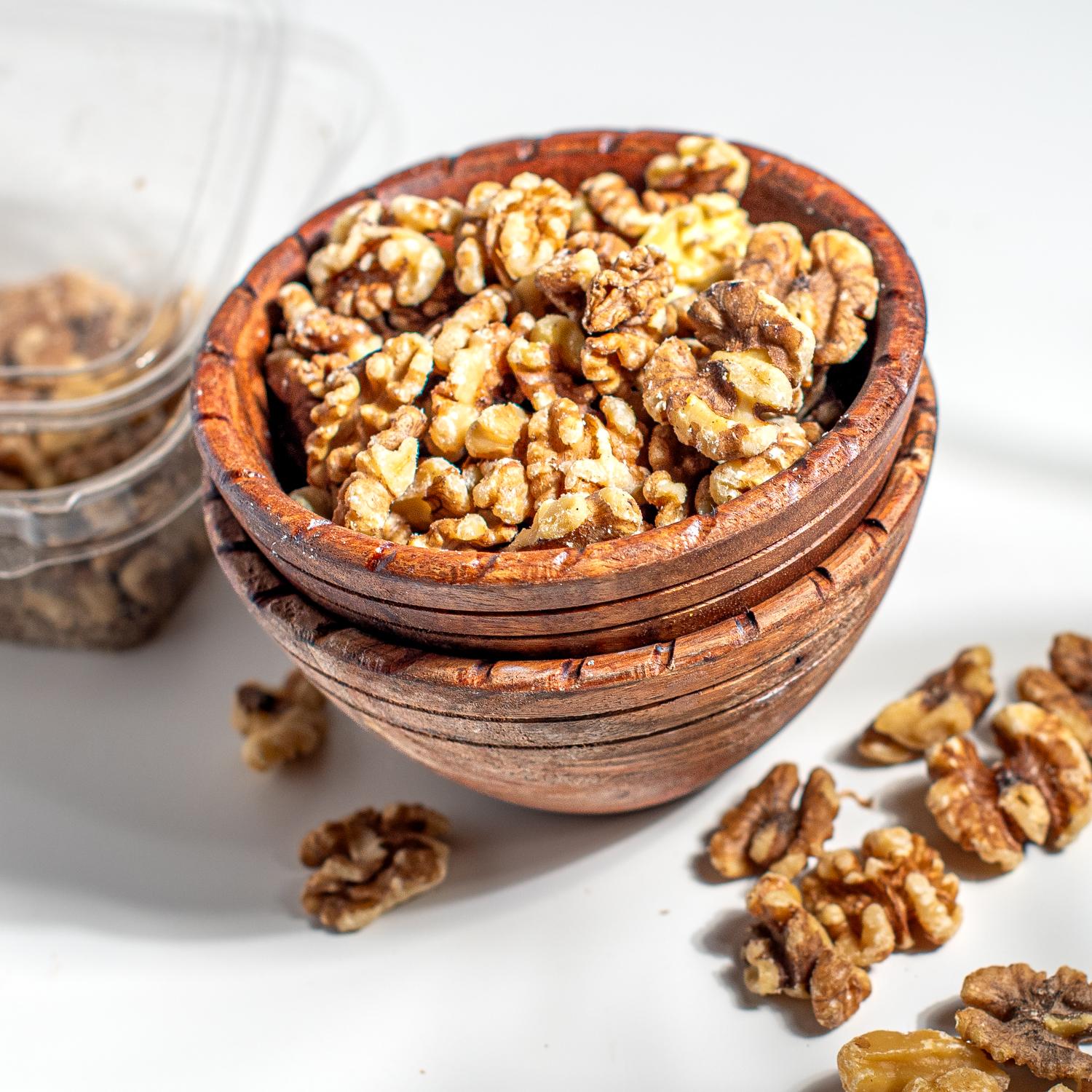 Raw Walnuts in a bowl and a good source of vitamins and protein