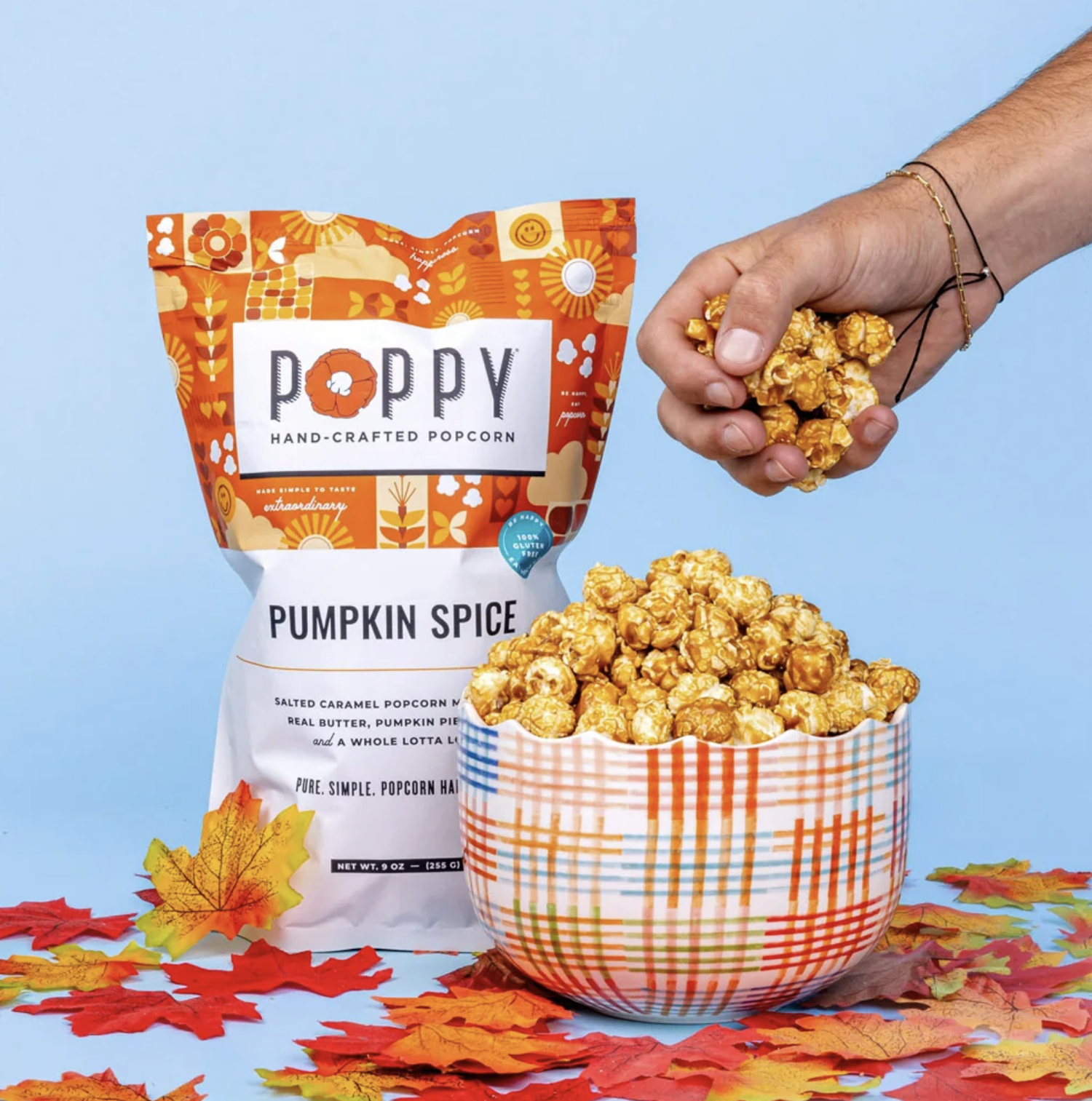 Poppy Handcraafted Pumpkin Spice Popcorn Market Bag with a bowl of popcorn and leaves