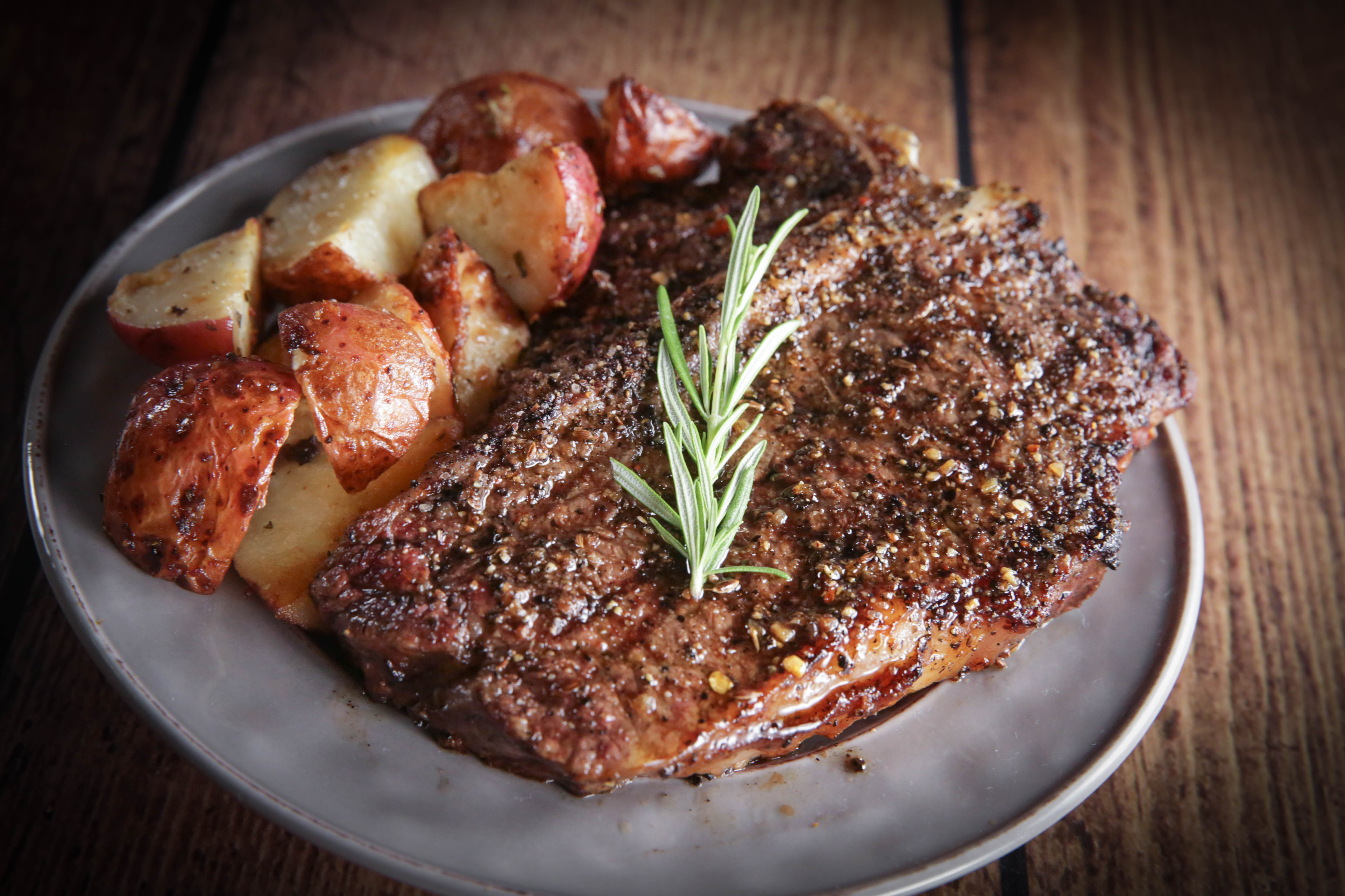 prime porterhouse steak with potatoes