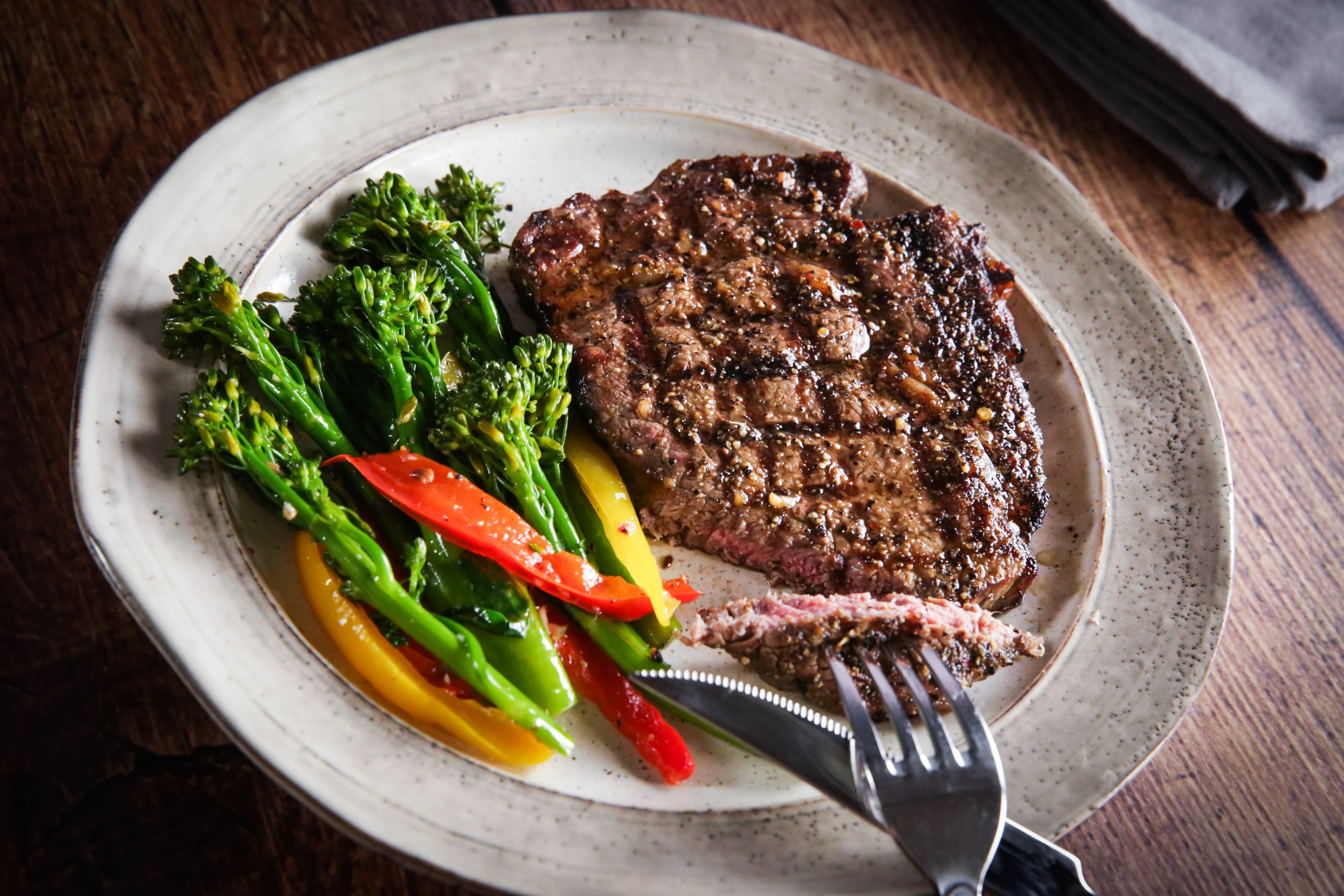 prime ribeye steak with vegetables