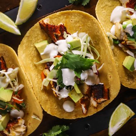 Fish Tacos with Lime Crema & Cabbage Slaw