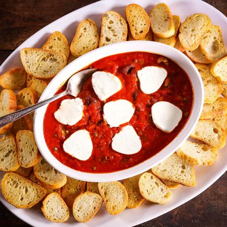 Baked Goat Cheese With Tomatoes, Olives, and Capers