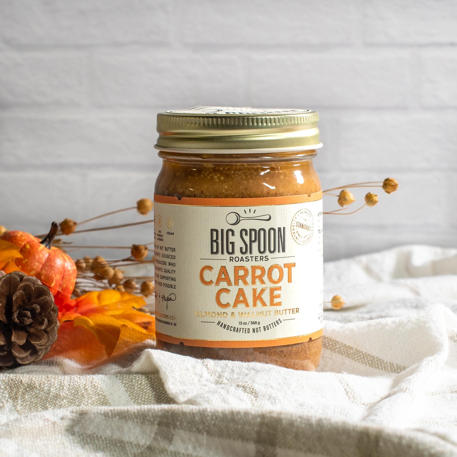 Big Spoon Roaster Carrot Cake almond and walnut butter full size 13 oz jar in a fall setting