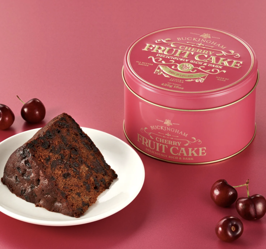Sliced Buckingham Cherry Fruit Cake showing real cherries