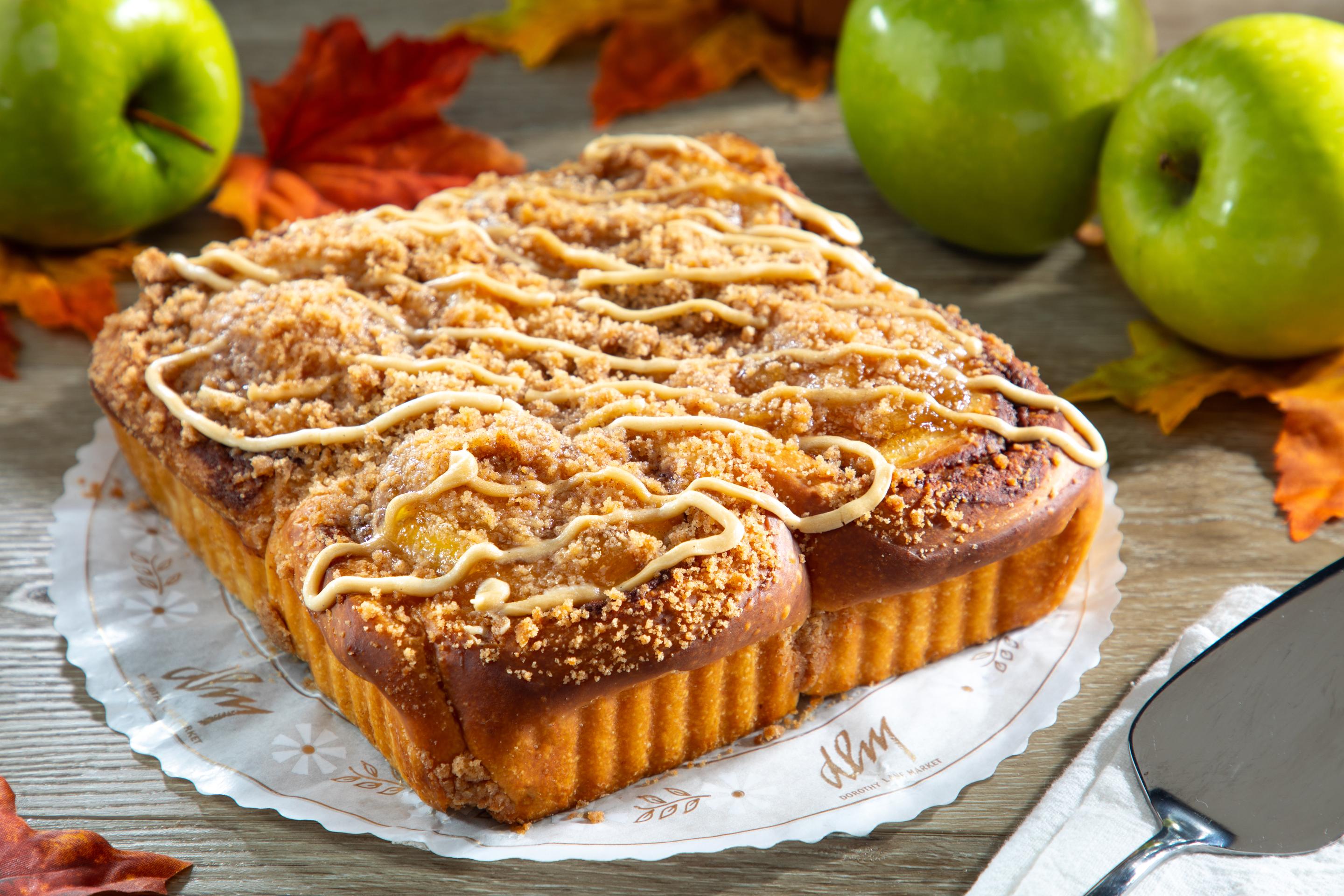 Caramel Apple Cinnamon Rolls for Fall loaded with chunks of fresh apple and drizzled with maple cream and caramel