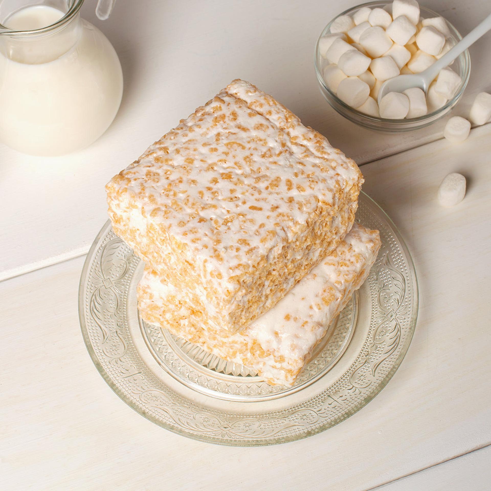 The Crispery gourmet marshmallow rice crispy cake displayed alongside Dorothy Lane Market bakery treats and gifts.