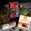 Luxury European Christmas gift box with imported chocolates set on a holiday table