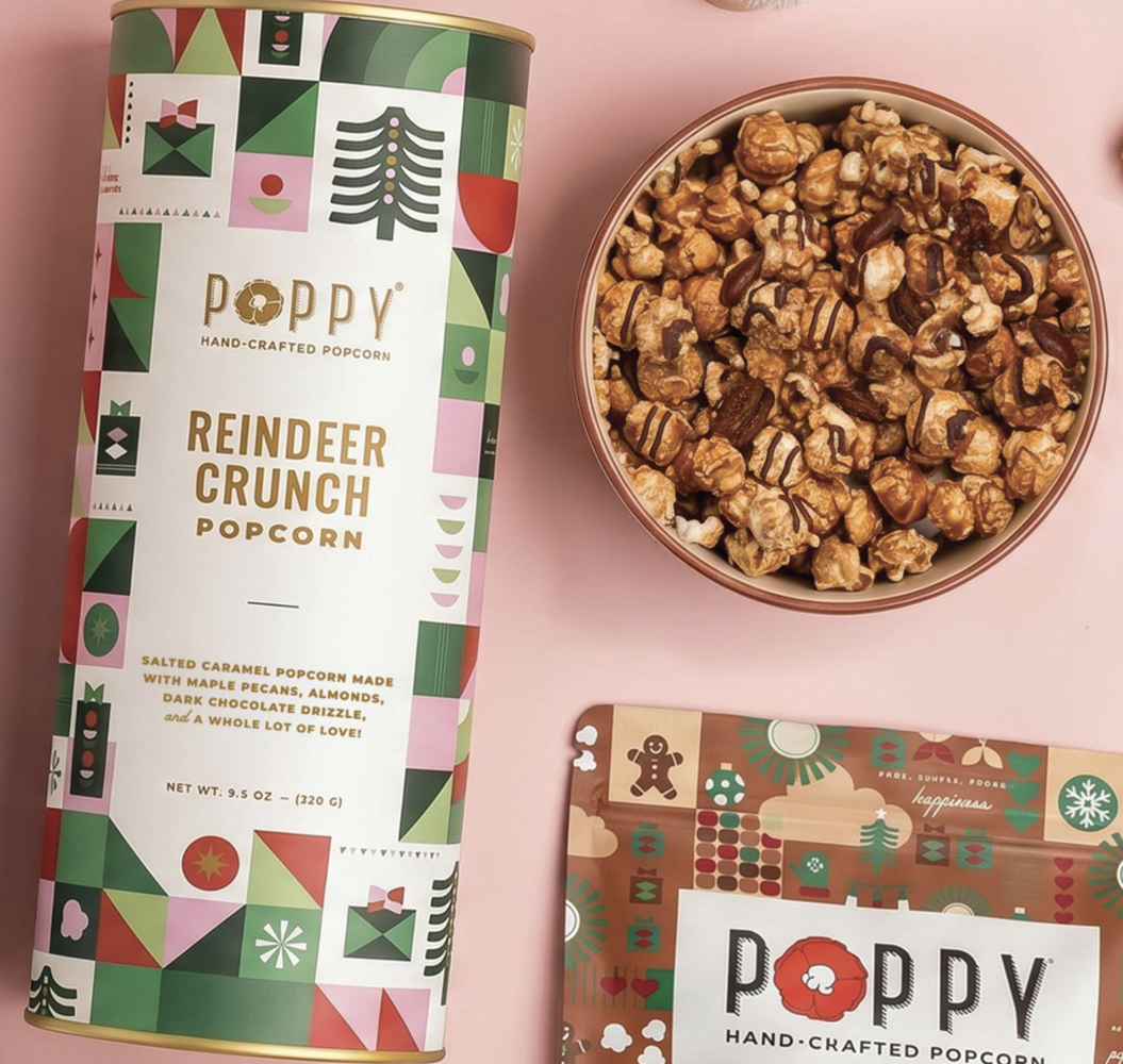 Poppy Reindeer Crunch Popcorn Cylinder salted caramel popcorn with almonds and chocolate drizzle