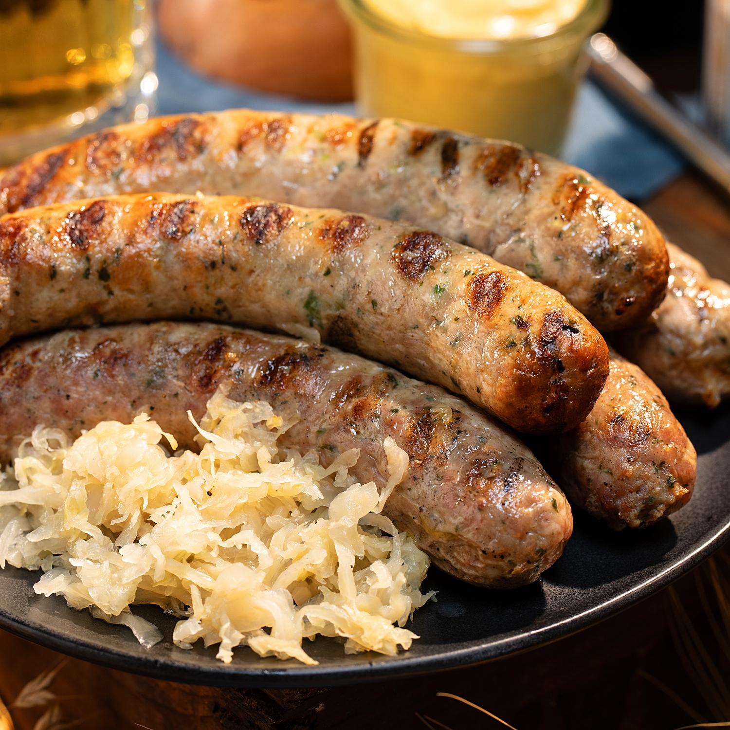 Oktoberst cooked bratwurst with sauerkraut