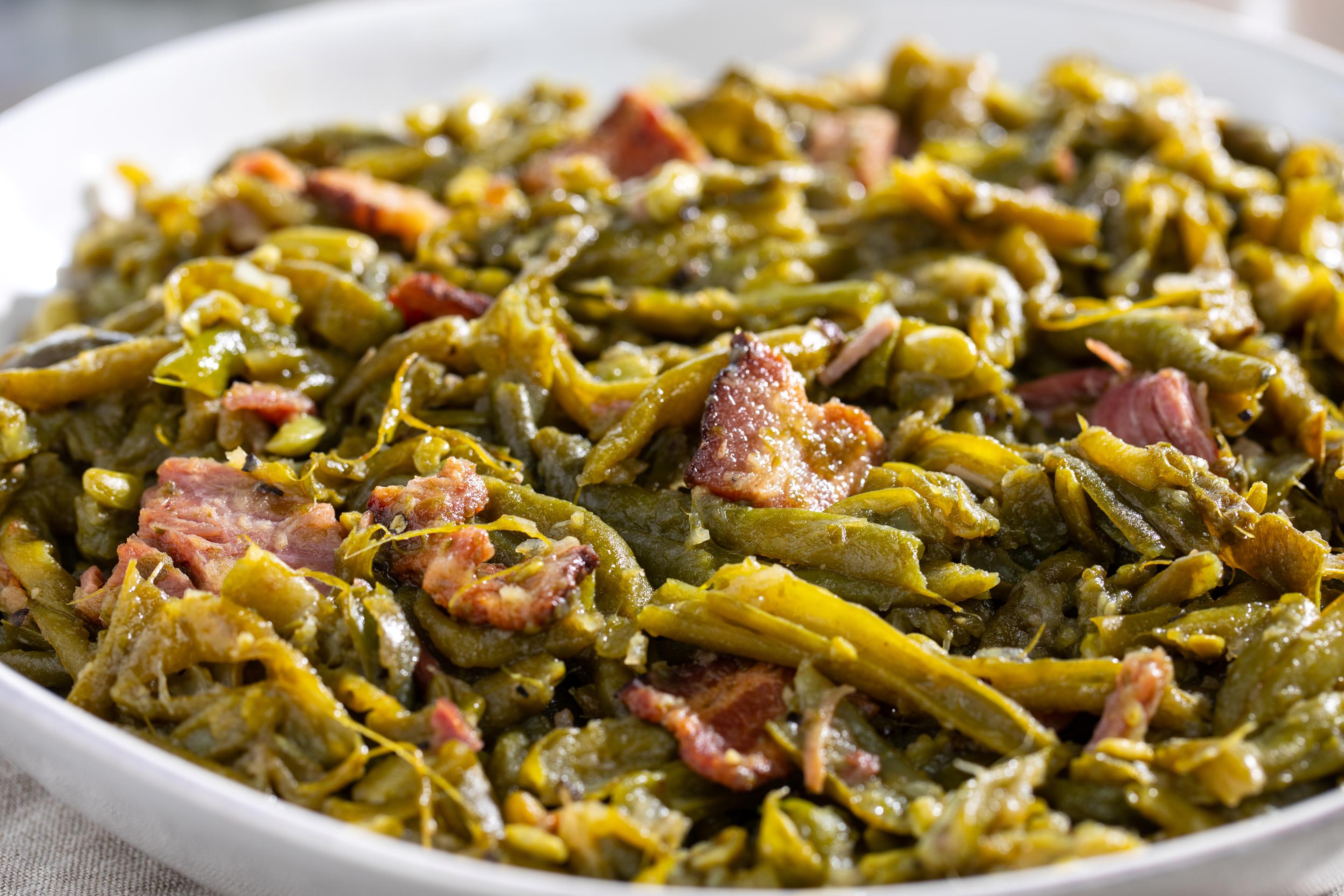 Southern Style Green Beans with ham, bacon and slowed cooked for creamy texture and smoky flavor