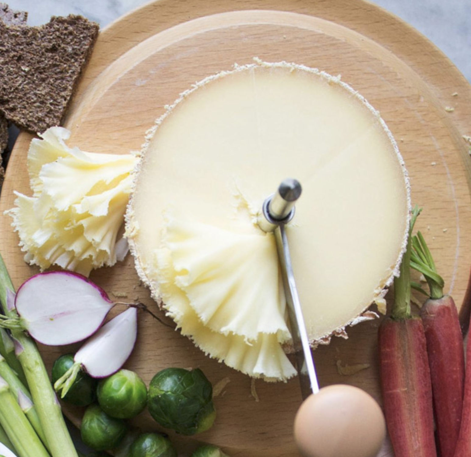 Tete De Moine Cheese from the swiss alps, perfect for cheese curler