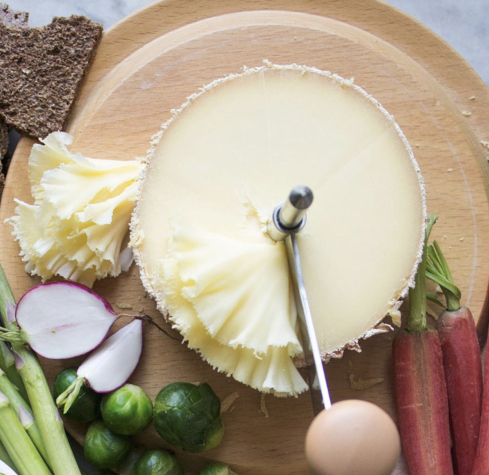 P'tit Basque cheese curled into florets using a Girolle cheese curler